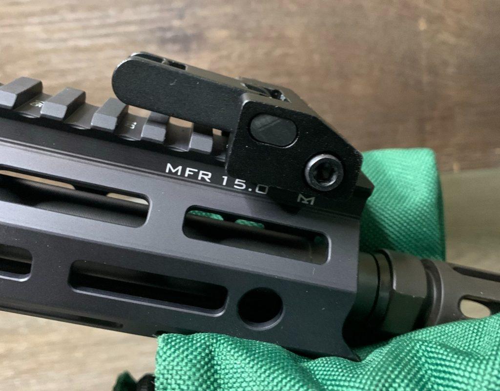 The front sight folded, side view. Here you can see the allen wrench slot for mounting.