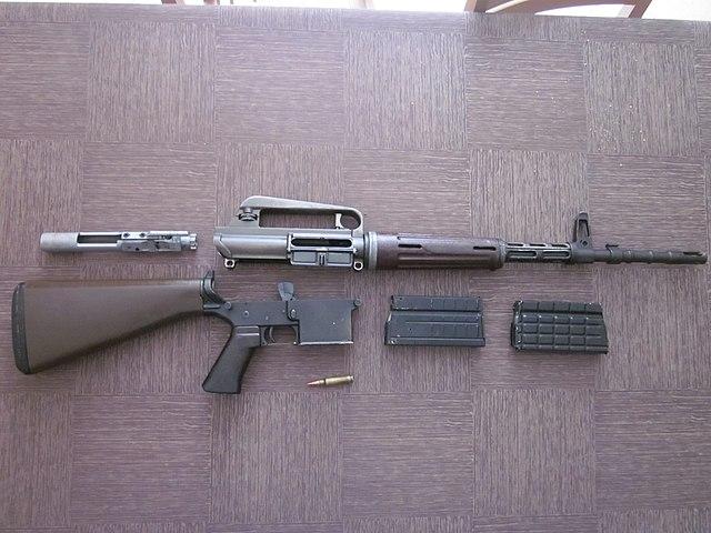 An exploded AR10 rifle.