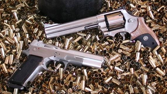 A Bren Ten 10mm Auto (bottom) & SW 610 Classic in 10mm