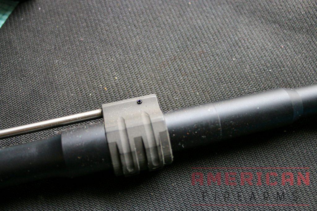 Hammer the roll pin in until it is flush against both sides of the gas block