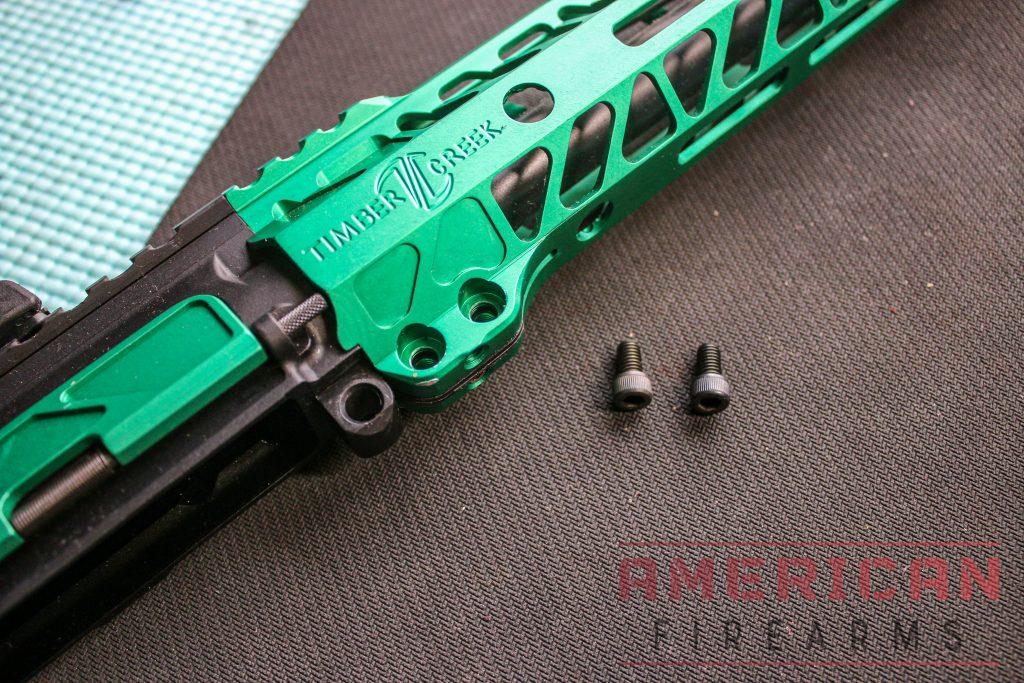 Repeat the thread locker application to the two side set screws and tighten down.