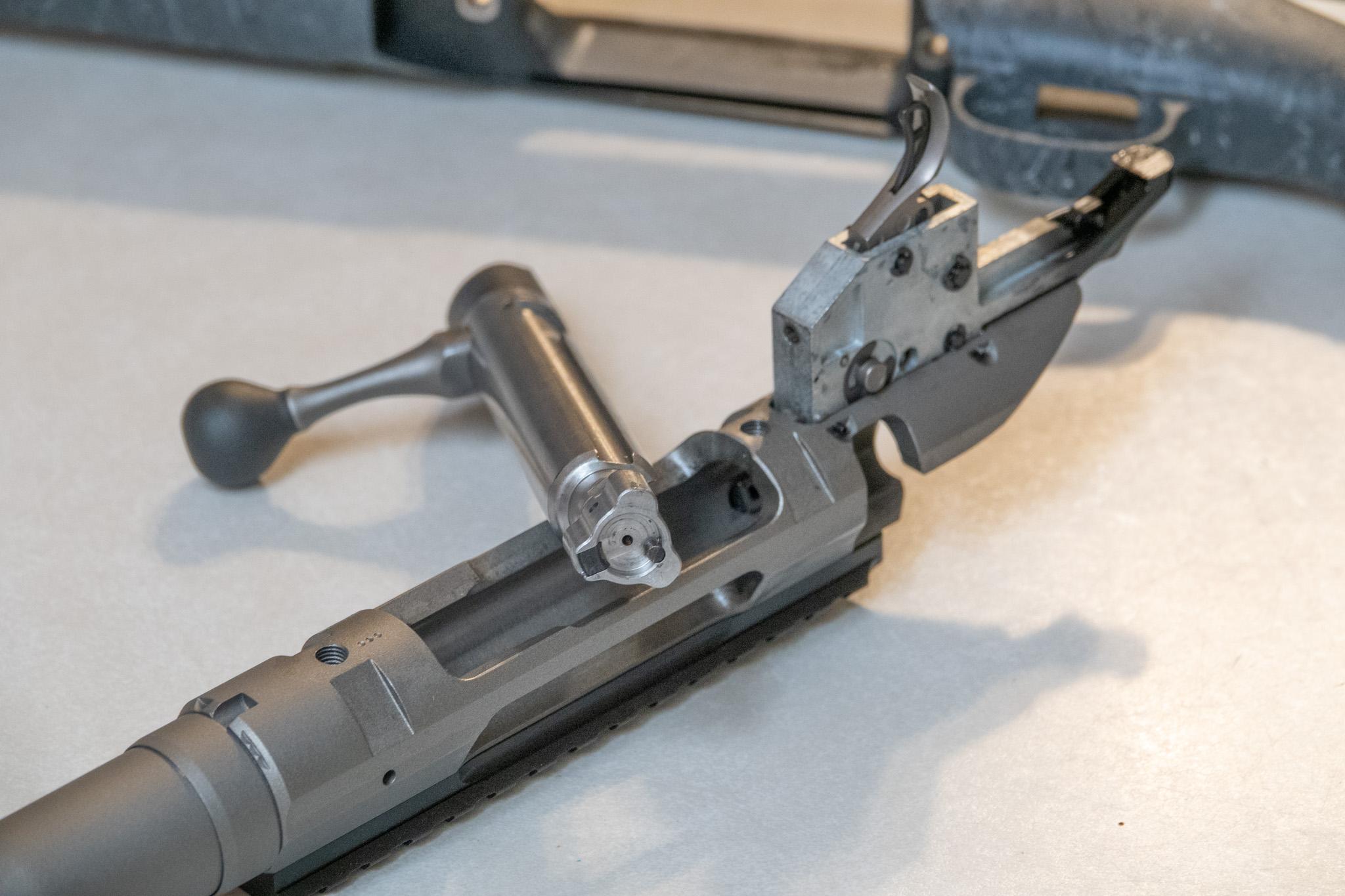 Three-lug bolt removed from Ruger American receiver showing lug pattern